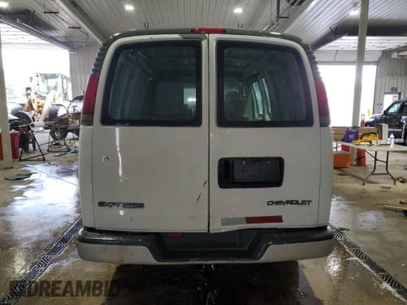 2000 Chevrolet Express Cargo with VIN 1GCFG15W1Y1116497, listed as a Copart auction lot 87206044 with 166,856 mi miles and Salvage title. Bid and sale history available at DreamBid. Image 6.