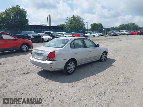 2004 Hyundai Elantra GLS with VIN KMHDN46D74U908959, listed as a IAAI auction lot 42744146 with 125,523 mi miles and . Bid and sale history available at DreamBid. Image 4.