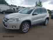 2011 Volkswagen Tiguan S with VIN WVGBV7AXXBW560022, listed as a IAAI auction lot 42693212 with 127,879 mi miles and . Bid and sale history available at DreamBid. Image 2.