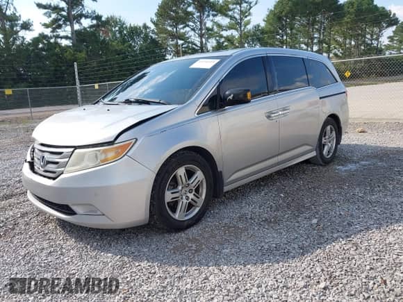 2012 Honda Odyssey Touring с VIN 5FNRL5H90CB004277, выставлен на аукционе IAAI как лот 43251419 с пробегом 122 081 миль миль и . История ставок и продаж доступна на DreamBid. Изображение 17.