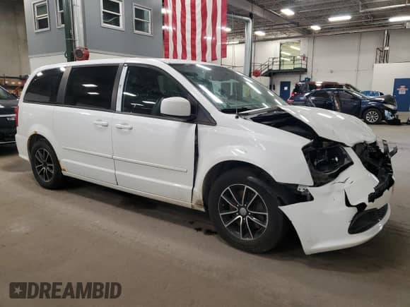 2015 Dodge Grand Caravan American Value with VIN 2C4RDGBG3FR705159, listed as a Copart auction lot 87060515 with 226,813 mi miles and Salvage title. Bid and sale history available at DreamBid. Image 4.