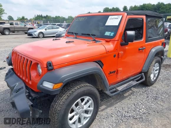 2023 Jeep Wrangler Sport with VIN 1C4HJXAG1PW692362, listed as a IAAI auction lot 42659087 with 52,179 mi miles and . Bid and sale history available at DreamBid. Image 2.