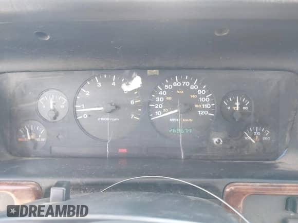 1996 Jeep Grand Cherokee Laredo z VIN 1J4GZ58S2TC262980, wystawiony jako IAAI lot #41949514 z przebiegiem 269 674 mil mil oraz . Historia ofert i sprzedaży dostępna na DreamBid. Obrazek 7.