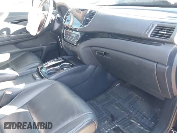 2020 Honda Pilot Touring 7-Passenger z VIN 5FNYF5H64LB006073, wystawiony jako IAAI lot #41750282 z przebiegiem 73 214 mil mil oraz . Historia ofert i sprzedaży dostępna na DreamBid. Obrazek 5.