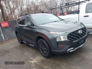 2022 Hyundai Santa Fe XRT с VIN 5NMS6DAJ4NH409308, выставлен на аукционе IAAI как лот 41187786 с пробегом 24 951 миль миль и . История ставок и продаж доступна на DreamBid. Изображение 1.