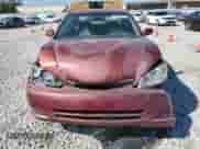 2002 Toyota Camry LE z VIN 4T1BE32K22U016251, wystawiony jako Copart lot #84827955 z przebiegiem 283 817 mil mil oraz Szkoda całkowita • Salvage title. Historia ofert i sprzedaży dostępna na DreamBid. Obrazek 5.