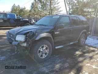 2001 Nissan Pathfinder LE z VIN JN8DR09Y71W576560, wystawiony jako Copart lot #88561345 z przebiegiem 67 263 mil mil oraz Szkoda całkowita • Salvage title. Historia ofert i sprzedaży dostępna na DreamBid. Obrazek 1.