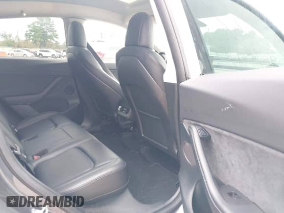 2021 Tesla Model Y Long Range with VIN 5YJYGDEE1MF217624, listed as a IAAI auction lot 42842945 with 58,610 mi miles and . Bid and sale history available at DreamBid. Image 8.