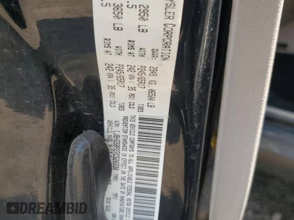 2007 Jeep Commander Limited with VIN 1J8HG58P27C520330, listed as a Copart auction lot 54595745 with 168,908 mi miles and Salvage title. Bid and sale history available at DreamBid. Image 13.