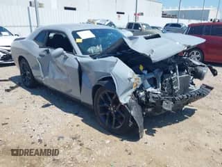 2020 Dodge Challenger SXT with VIN 2C3CDZAG9LH189821, listed as a IAAI auction lot 43149554 with 63,994 mi miles and . Bid and sale history available at DreamBid. Image 1.