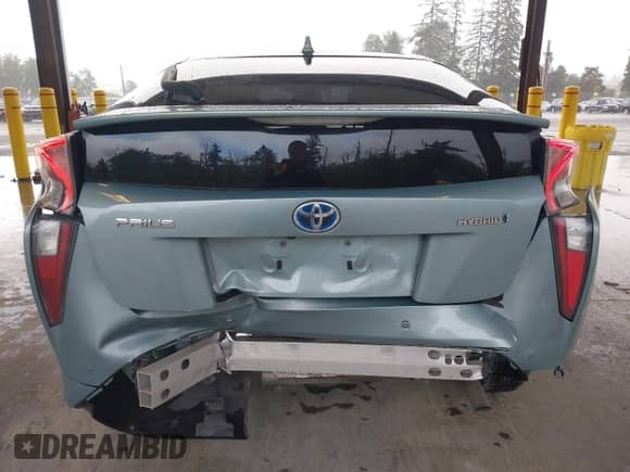 2016 Toyota Prius Four z VIN JTDKARFU9G3024875, wystawiony jako IAAI lot #42314235 z przebiegiem 101 383 mil mil oraz . Historia ofert i sprzedaży dostępna na DreamBid. Obrazek 6.