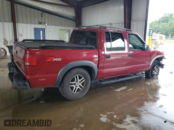 2004 Chevrolet S-10 LS z VIN 1GCDT13X44K141199, wystawiony jako Copart lot #63681715 z przebiegiem 125 327 mil mil oraz Szkoda całkowita • Salvage title. Historia ofert i sprzedaży dostępna na DreamBid. Obrazek 3.