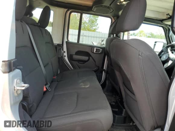 2023 Jeep Wrangler with VIN 1C4JJXN64PW612930, listed as a Copart auction lot 65946035 with 5,631 mi miles and Salvage title. Bid and sale history available at DreamBid. Image 11.