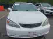 2004 Toyota Camry LE with VIN 4T1BE32KX4U353074, listed as a IAAI auction lot 43238071 with 320,472 mi miles and . Bid and sale history available at DreamBid. Image 6.