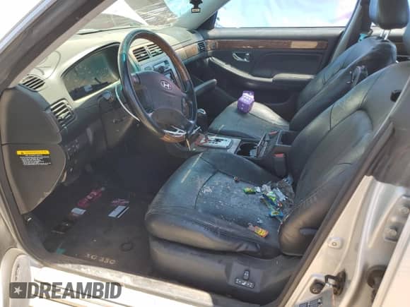 2004 Hyundai XG z VIN KMHFU45E64A320817, wystawiony jako Copart lot #58951955 z przebiegiem 179 978 mil mil oraz Nie do naprawy • Non repairable. Historia ofert i sprzedaży dostępna na DreamBid. Obrazek 7.