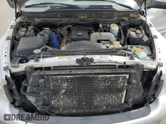 2004 Dodge 3500 SLT с VIN 3D7MU48C04G152296, выставлен на аукционе Copart как лот 75357134 с пробегом 287 879 миль миль и Списание • Salvage title. История ставок и продаж доступна на DreamBid. Изображение 11.