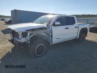 2024 Toyota Tacoma TRD Off Road with VIN 3TMLB5JN8RM013149, listed as a Copart auction lot 82496085 with 21,215 mi miles and Salvage title. Bid and sale history available at DreamBid. Image 1.