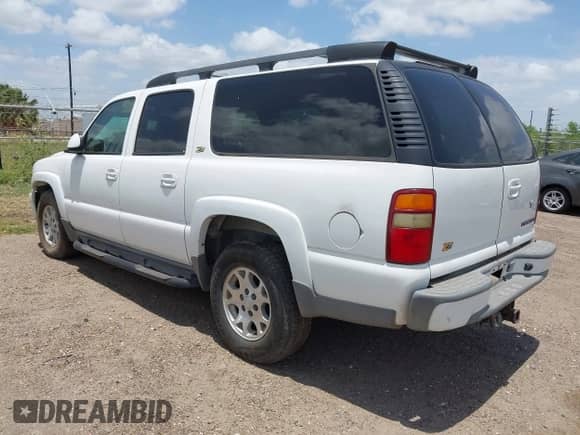 2002 Chevrolet Suburban Z71 with VIN 3GNFK16Z72G137619, listed as a IAAI auction lot 42476821 with Not provided miles and . Bid and sale history available at DreamBid. Image 3.