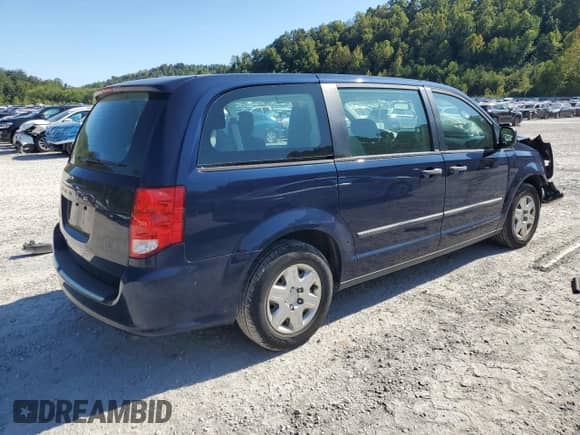 2013 Dodge Grand Caravan SE with VIN 2C4RDGBG7DR712614, listed as a Copart auction lot 80000875 with 74,660 mi miles and Salvage title. Bid and sale history available at DreamBid. Image 3.