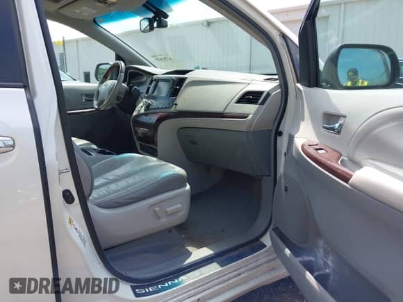 2011 Toyota Sienna XLE AAS with VIN 5TDYK3DCXBS036300, listed as a IAAI auction lot 42783620 with 199,813 mi miles and . Bid and sale history available at DreamBid. Image 5.