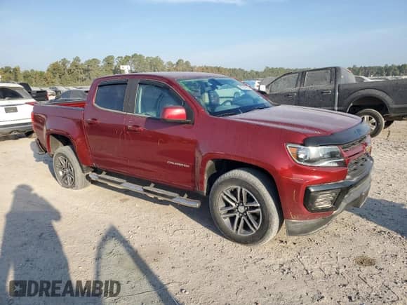 2021 Chevrolet Colorado 2WD Work Truck with VIN 1GCGSBEN6M1226164, listed as a Copart auction lot 82707835 with 34,658 mi miles and Salvage title. Bid and sale history available at DreamBid. Image 4.