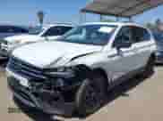 2024 Volkswagen Tiguan SE with VIN 3VVNB7AX4RM198923, listed as a IAAI auction lot 42312597 with 6,827 mi miles and . Bid and sale history available at DreamBid. Image 2.