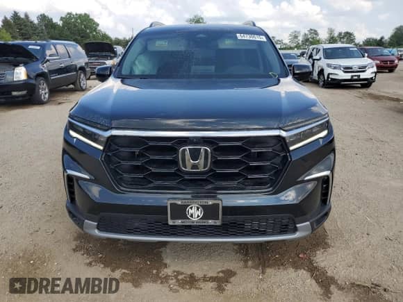 2023 Honda Pilot Elite with VIN 5FNYG1H8XPB041956, listed as a Copart auction lot 64730615 with 27,173 mi miles and Salvage title. Bid and sale history available at DreamBid. Image 5.
