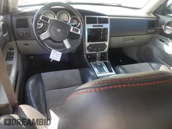 2007 Dodge Charger SRT-8 с VIN 2B3LA73W37H668188, выставлен на аукционе Copart как лот 68350674 с пробегом 150 769 миль миль и Списание • Salvage title. История ставок и продаж доступна на DreamBid. Изображение 8.