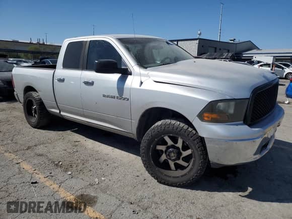 2011 Ram 1500 ST with VIN 1D7RB1GP2BS628570, listed as a Copart auction lot 81310045 with 200,069 mi miles and Salvage title. Bid and sale history available at DreamBid. Image 4.