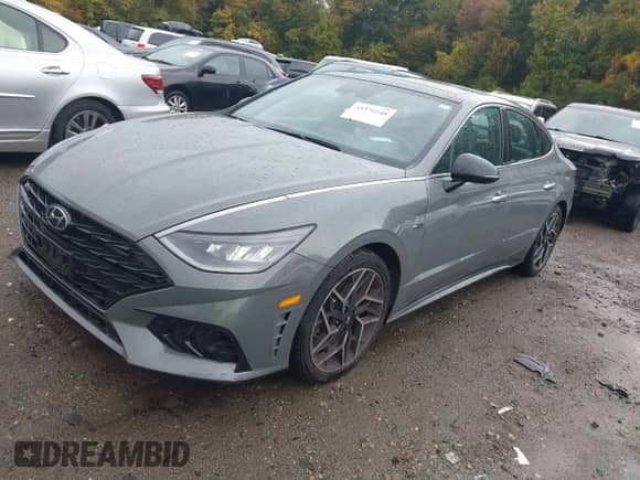 2023 Hyundai Sonata N Line with VIN KMHL14JC4PA261545, listed as a IAAI auction lot 43398148 with 67,022 mi miles and . Bid and sale history available at DreamBid. Image 17.