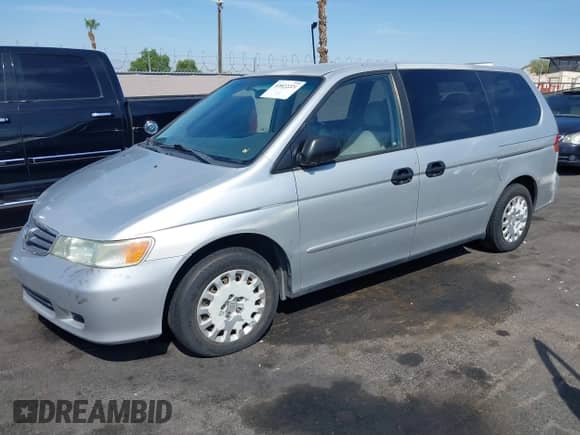 2004 Honda Odyssey LX with VIN 5FNRL18524B063998, listed as a IAAI auction lot 43022221 with 174,551 mi miles and . Bid and sale history available at DreamBid. Image 2.