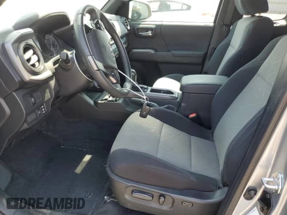 2022 Toyota Tacoma SR z VIN 3TYSZ5AN4NT074178, wystawiony jako Copart lot #67775625 z przebiegiem 20 776 mil mil oraz Szkoda całkowita • Salvage title. Historia ofert i sprzedaży dostępna na DreamBid. Obrazek 7.