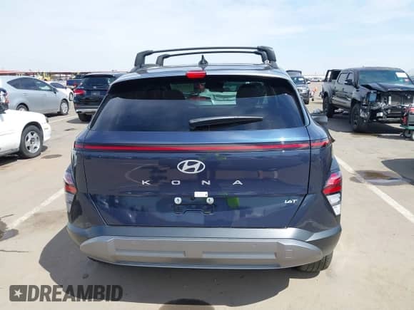2025 Hyundai Kona Limited z VIN KM8HE3A30SU309621, wystawiony jako IAAI lot #43127017 z przebiegiem 1 820 mil mil oraz . Historia ofert i sprzedaży dostępna na DreamBid. Obrazek 17.