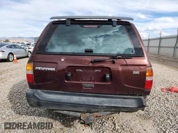 1997 Nissan Pathfinder XE z VIN JN8AR05Y4VW157712, wystawiony jako Copart lot #82383665 z przebiegiem 190 840 mil mil oraz Szkoda całkowita • Salvage title. Historia ofert i sprzedaży dostępna na DreamBid. Obrazek 6.