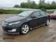 2015 Chevrolet Volt z VIN 1G1RA6E43FU112160, wystawiony jako Copart lot #61825903 z przebiegiem 113 365 mil mil oraz . Historia ofert i sprzedaży dostępna na DreamBid. Obrazek 1.