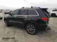 2017 Jeep Grand Cherokee Overland with VIN 1C4RJFCG2HC866857, listed as a Copart auction lot 81090725 with 119,242 mi miles and Salvage title. Bid and sale history available at DreamBid. Image 2.
