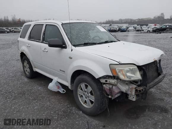 2008 Mercury Mariner with VIN 4M2CU91128KJ03668, listed as a IAAI auction lot 41213830 with 240,480 mi miles and . Bid and sale history available at DreamBid. Image 1.