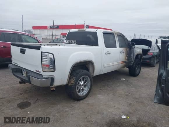 2008 GMC Sierra 1500 Work Truck with VIN 2GTEK13M281239134, listed as a IAAI auction lot 41535863 with Not provided miles and . Bid and sale history available at DreamBid. Image 4.