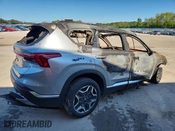 2022 Hyundai Santa Fe Limited with VIN 5NMS4DALXNH458021, listed as a Copart auction lot 69097685 with Not provided miles and Non repairable. Bid and sale history available at DreamBid. Image 3.