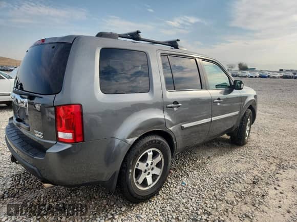 2009 Honda Pilot Touring with VIN 5FNYF48969B025883, listed as a Copart auction lot 70923065 with 192,552 mi miles and Salvage title. Bid and sale history available at DreamBid. Image 3.