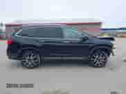 2020 Honda Pilot Elite z VIN 5FNYF6H0XLB003034, wystawiony jako IAAI lot #41945519 z przebiegiem 47 605 mil mil oraz . Historia ofert i sprzedaży dostępna na DreamBid. Obrazek 13.