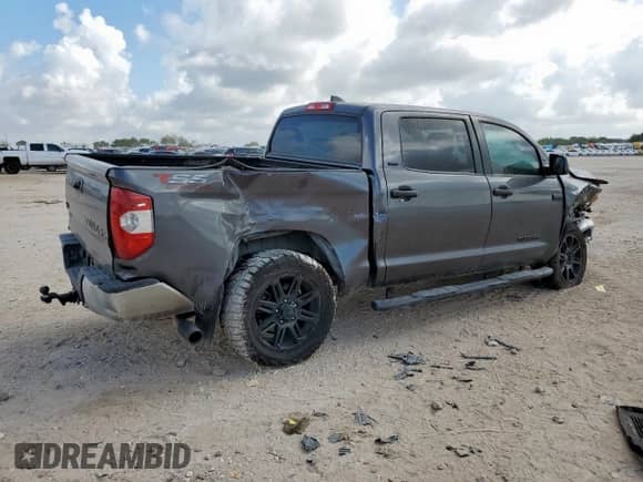 2020 Toyota Tundra SR5 with VIN 5TFDY5F15LX945111, listed as a Copart auction lot 70679165 with 147,342 mi miles and Salvage title. Bid and sale history available at DreamBid. Image 3.