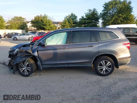 2016 Honda Pilot EX-L z VIN 5FNYF6H5XGB017033, wystawiony jako IAAI lot #43264900 z przebiegiem 143 720 mil mil oraz . Historia ofert i sprzedaży dostępna na DreamBid. Obrazek 14.