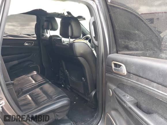 2017 Jeep Grand Cherokee Overland with VIN 1C4RJFCT0HC843199, listed as a IAAI auction lot 43096675 with 119,614 mi miles and . Bid and sale history available at DreamBid. Image 8.