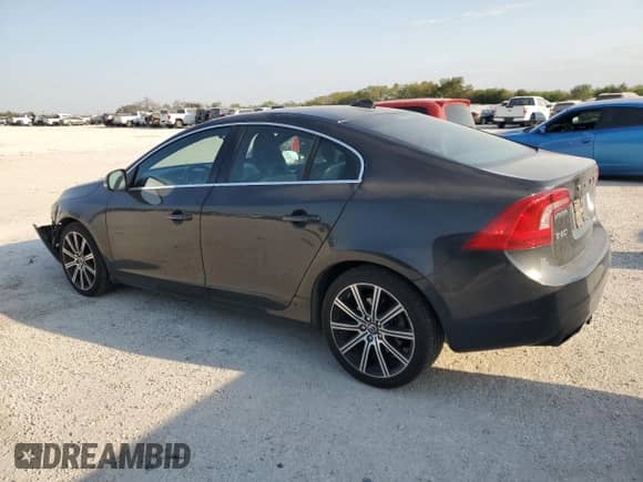 2015 Volvo S60 T6 Drive-E with VIN YV149MFK7F1343313, listed as a Copart auction lot 76279894 with 60,091 mi miles and Salvage title. Bid and sale history available at DreamBid. Image 2.