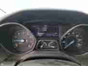 2013 Ford Focus Titanium z VIN 1FADP3N21DL194721, wystawiony jako Copart lot #59067415 z przebiegiem 153 071 mil mil oraz Szkoda całkowita • Salvage title. Historia ofert i sprzedaży dostępna na DreamBid. Obrazek 9.