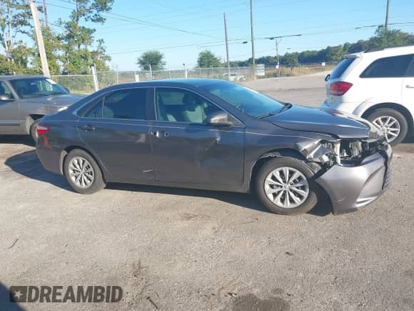 2015 Toyota Camry SE z VIN 4T1BF1FKXFU498713, wystawiony jako IAAI lot #43491138 z przebiegiem 211 840 mil mil oraz . Historia ofert i sprzedaży dostępna na DreamBid. Obrazek 13.