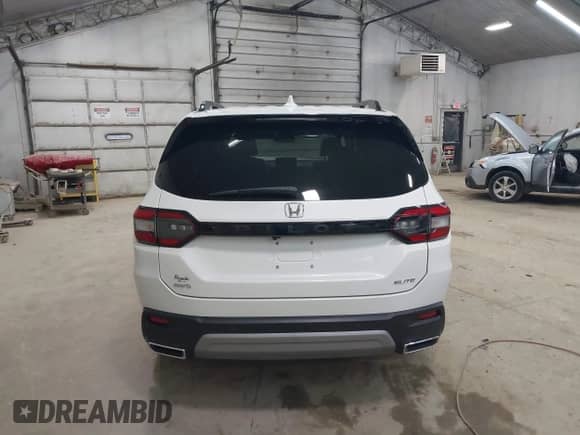 2025 Honda Pilot Elite с VIN 5FNYG1H89SB050057, выставлен на аукционе IAAI как лот 43267800 с пробегом 20 247 миль миль и . История ставок и продаж доступна на DreamBid. Изображение 16.