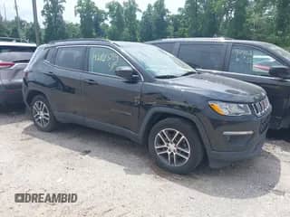 2018 Jeep Compass Latitude with VIN 3C4NJCBB1JT500479, listed as a IAAI auction lot 42673734 with 122,656 mi miles and . Bid and sale history available at DreamBid. Image 1.