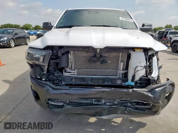 2025 Ram 1500 Tradesman with VIN 1C6RRFGG6SN543501, listed as a Copart auction lot 61486845 with 9,729 mi miles and Salvage title. Bid and sale history available at DreamBid. Image 5.